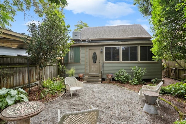 rear view of house with a patio area