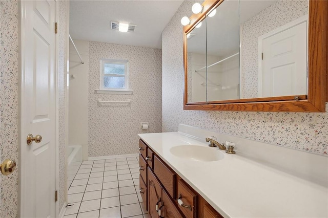 full bath with wallpapered walls, visible vents, tile patterned floors, tub / shower combination, and vanity