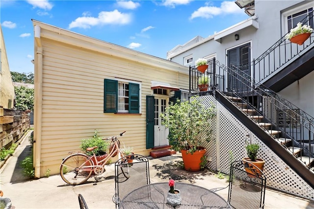 rear view of house with a patio