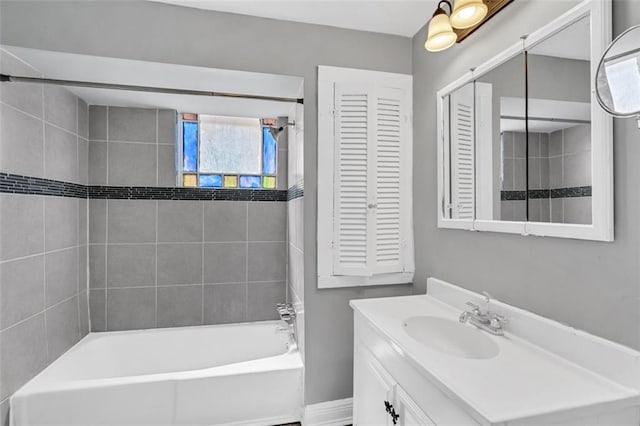 full bathroom with tub / shower combination and vanity