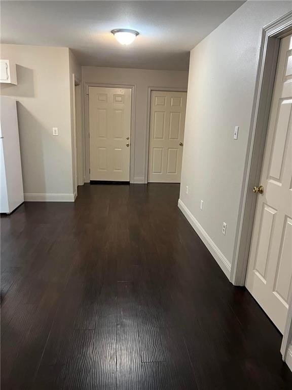 hall featuring dark hardwood / wood-style floors