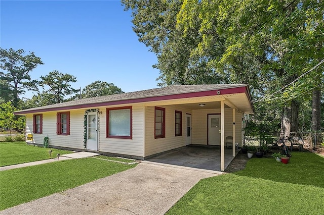 single story home with a carport and a front lawn