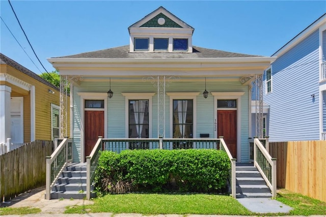 view of front of property featuring covered porch