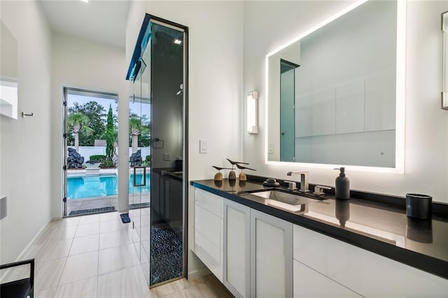 bathroom featuring tile patterned floors and vanity