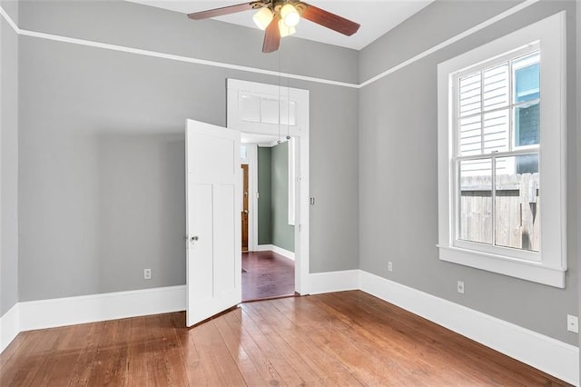 interior space featuring hardwood / wood-style floors and ceiling fan