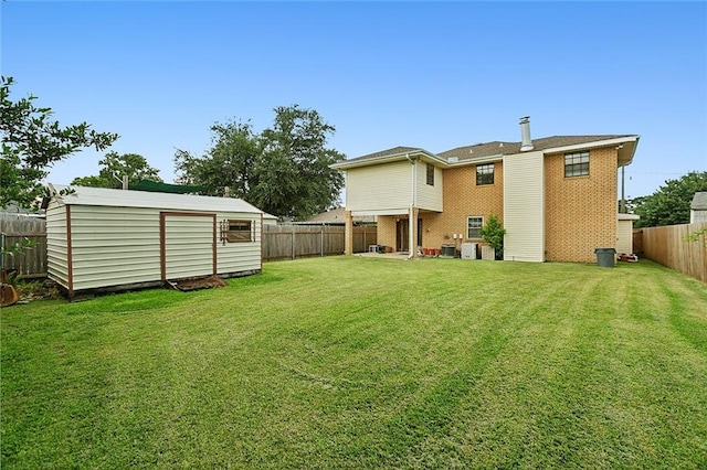 4508 Kawanee Ave, Metairie, LA 70006 - view of yard featuring a storage shed, a fenced backyard, and an outdoor structure