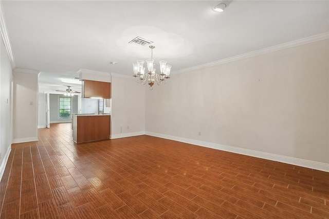 unfurnished room with dark wood finished floors, visible vents, ornamental molding, baseboards, and ceiling fan with notable chandelier