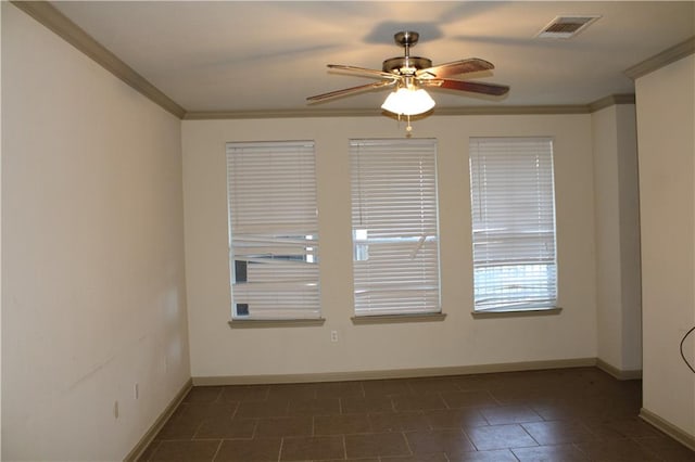 tiled spare room with crown molding and ceiling fan