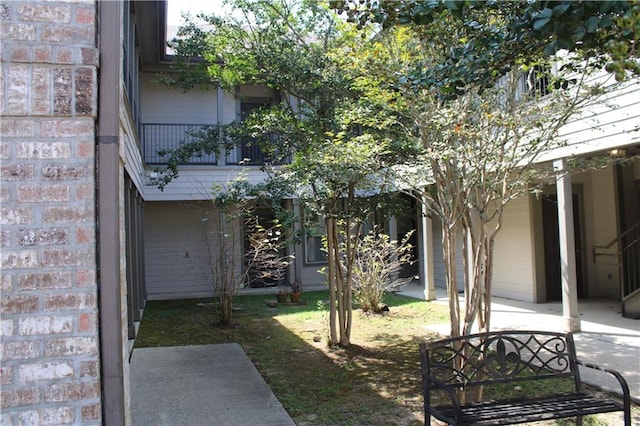 view of yard featuring a garage