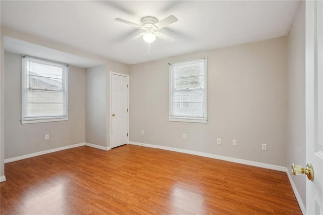 unfurnished bedroom featuring ceiling fan and light hardwood / wood-style floors