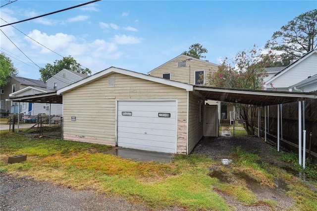 garage with a carport