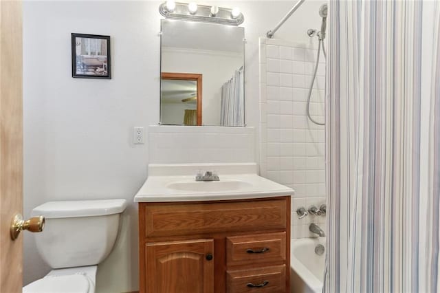 full bathroom with vanity, toilet, and shower / bath combination with curtain