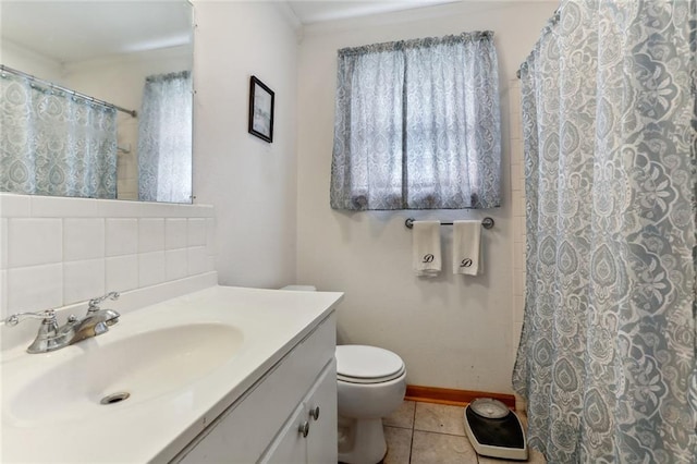 bathroom featuring a shower with shower curtain, tile patterned flooring, toilet, and vanity