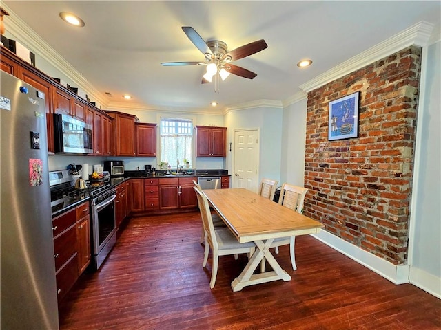 kitchen with ceiling fan, dark hardwood / wood-style floors, sink, crown molding, and appliances with stainless steel finishes