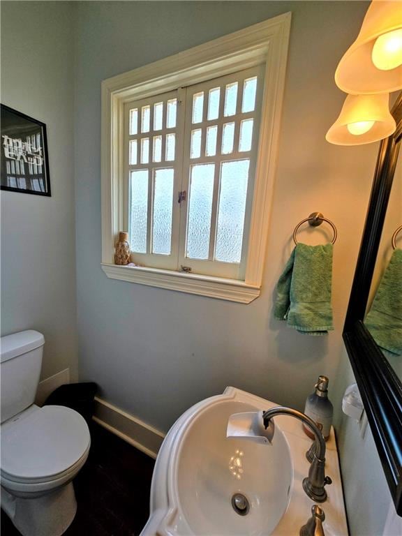 bathroom with sink and toilet