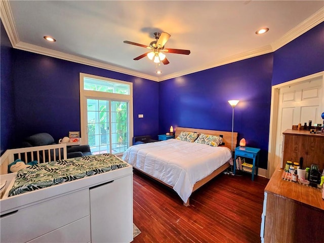 bedroom with ornamental molding, ceiling fan, and dark hardwood / wood-style flooring