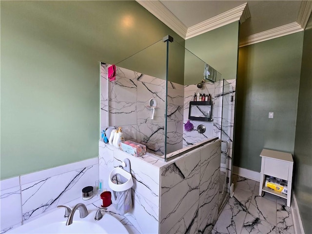 bathroom with crown molding and sink