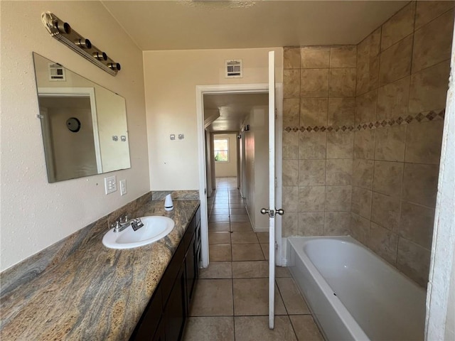 bathroom featuring vanity and tile patterned flooring