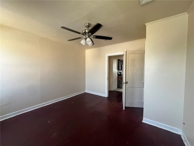 unfurnished room with ceiling fan