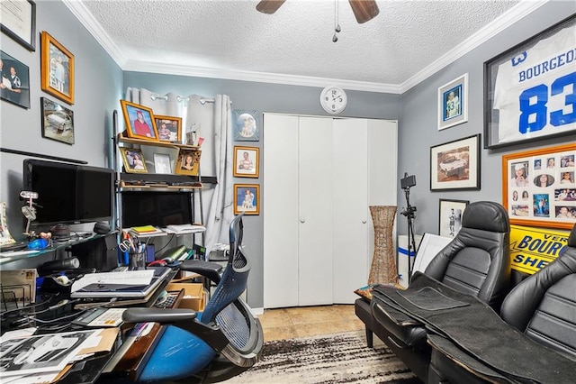 office space featuring ceiling fan, light tile patterned floors, a textured ceiling, and ornamental molding