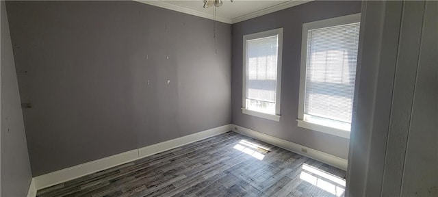 empty room with dark wood-type flooring, ceiling fan, and ornamental molding