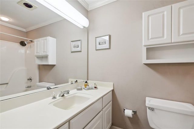 bathroom featuring a shower, toilet, crown molding, and vanity