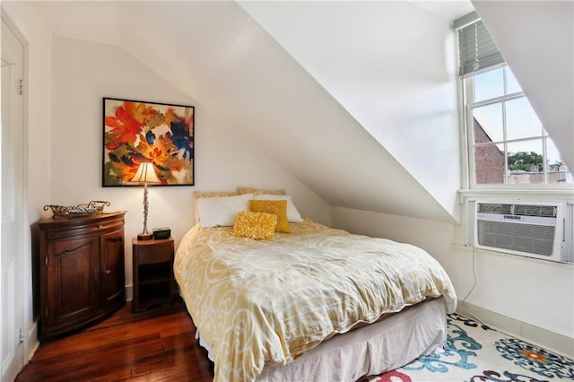 bedroom featuring vaulted ceiling and dark wood-type flooring