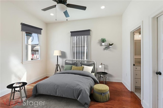 bedroom featuring ceiling fan and hardwood / wood-style flooring