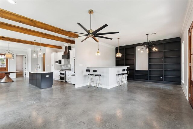 417 Nursery Ave, Metairie, LA 70005 - unfurnished living room with concrete floors, baseboards, a sink, beam ceiling, and ceiling fan