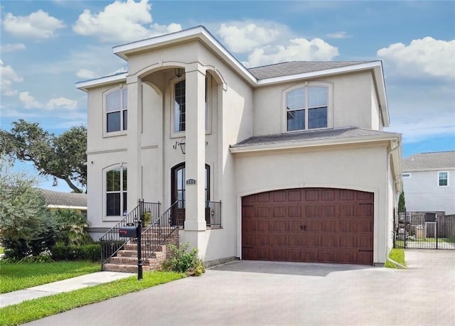 view of front of property featuring a garage