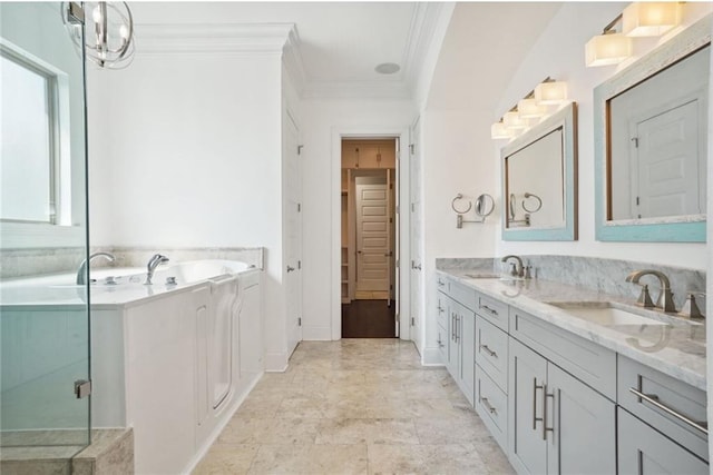 bathroom with crown molding, vanity, and a shower with shower door