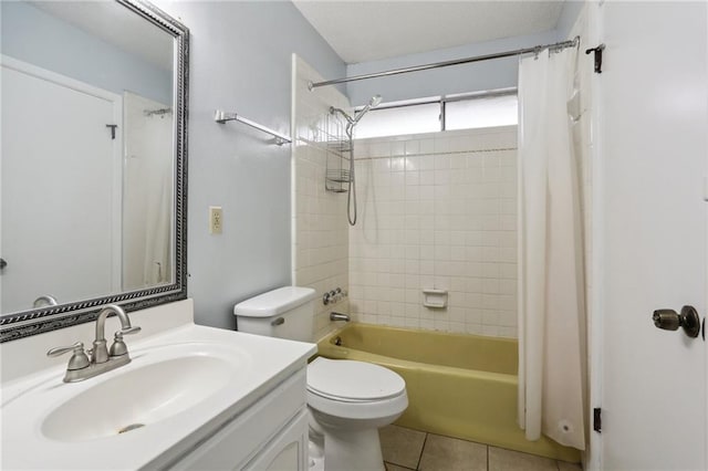 full bathroom featuring toilet, shower / bath combo with shower curtain, vanity, and tile patterned floors