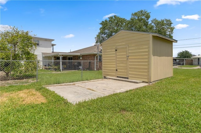 view of shed with fence