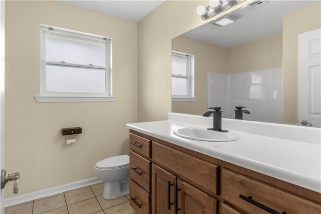 bathroom with tile patterned floors, visible vents, toilet, and vanity