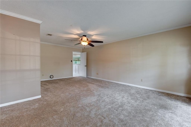 unfurnished room with crown molding, carpet, and ceiling fan