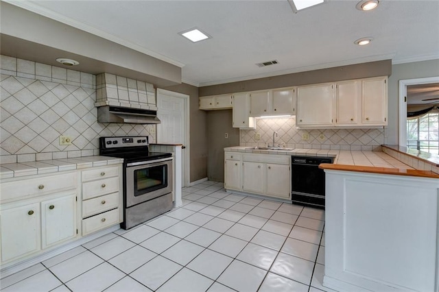 kitchen with stainless steel electric range oven, tile countertops, dishwasher, and sink