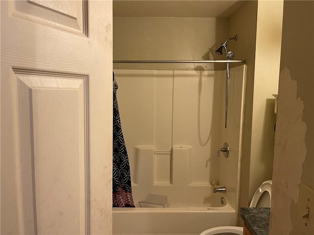 full bathroom with toilet, vanity, and shower / tub combo with curtain