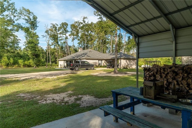 view of property's community with a lawn