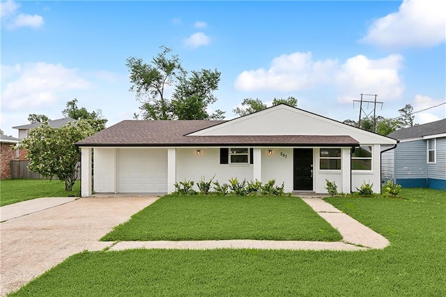 ranch-style home with a garage and a front yard