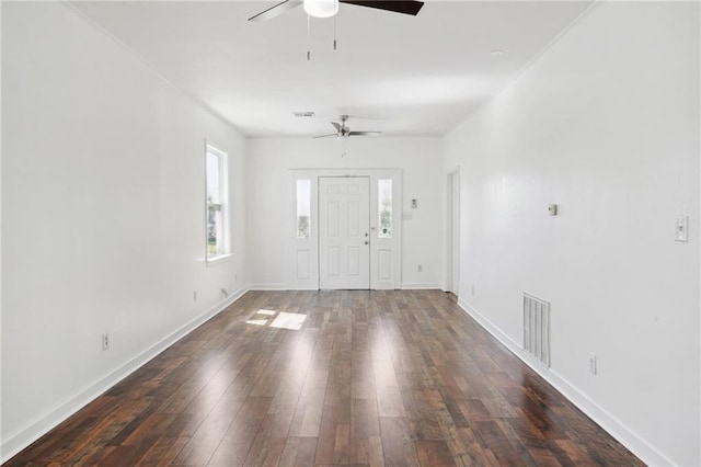 foyer entrance featuring ceiling fan and dark hardwood / wood-style flooring