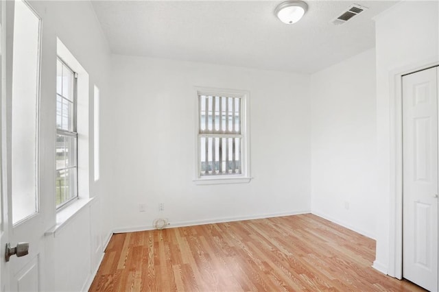 empty room featuring light wood-type flooring