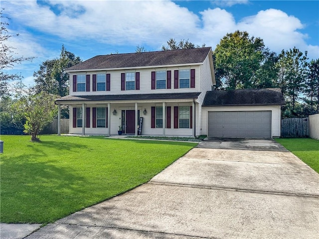 colonial-style house with a front yard, a porch, and a garage