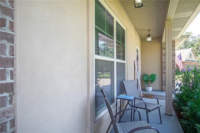 balcony featuring a porch