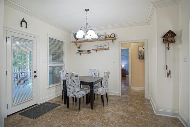 dining area with crown molding and an inviting chandelier