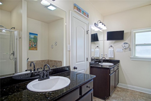 bathroom featuring vanity and walk in shower