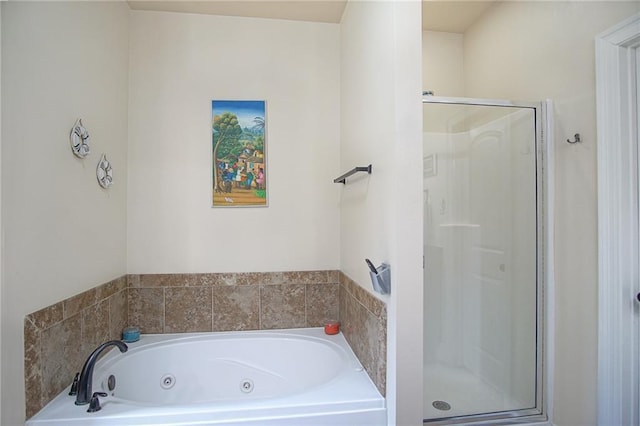 bathroom with shower with separate bathtub