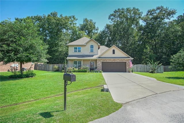 view of front of home featuring a garage and a front yard