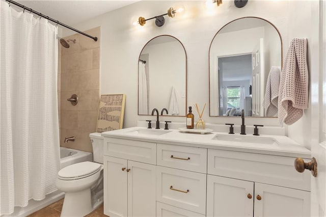 full bathroom with toilet, tile patterned flooring, shower / bathtub combination with curtain, and vanity