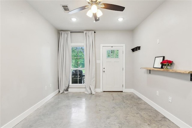 doorway to outside with ceiling fan