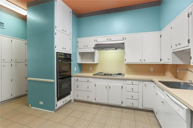 kitchen with dishwasher, stainless steel gas cooktop, white cabinets, sink, and double oven